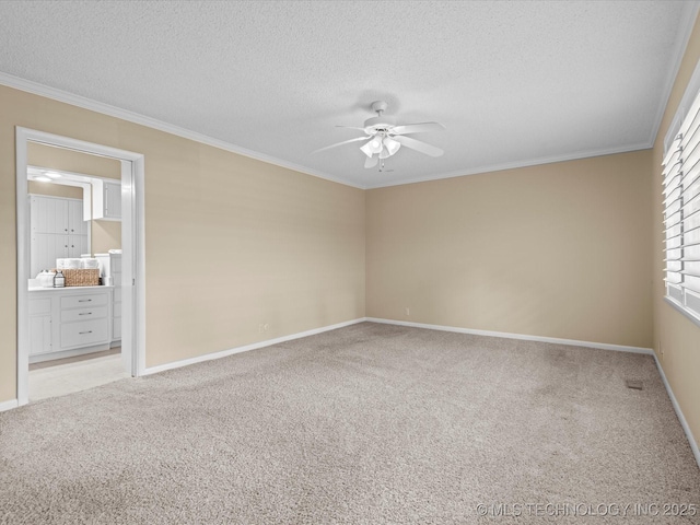 1525 Pecan Pl, Bartlesville, OK 74003 - unfurnished room featuring ceiling fan, crown molding, light colored carpet, and a textured ceiling