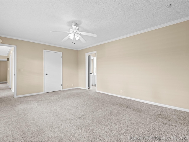 1525 Pecan Pl, Bartlesville, OK 74003 - unfurnished bedroom featuring carpet, ornamental molding, a textured ceiling, and ceiling fan