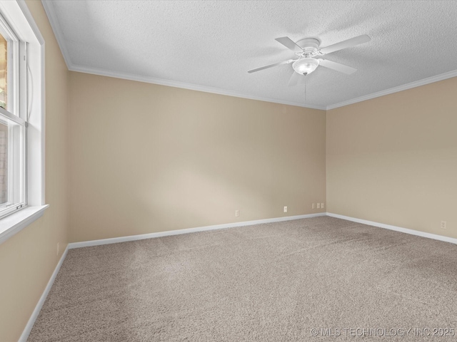 1525 Pecan Pl, Bartlesville, OK 74003 - carpeted empty room with a ceiling fan, a textured ceiling, and ornamental molding
