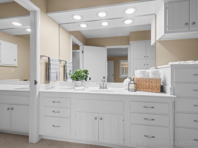 1525 Pecan Pl, Bartlesville, OK 74003 - bathroom featuring vanity, tile patterned floors, and recessed lighting