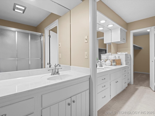 1525 Pecan Pl, Bartlesville, OK 74003 - full bath with vanity, a shower stall, and tile patterned floors