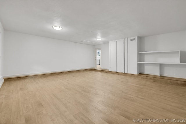 4235 E 104th St, Tulsa, OK 74137 - unfurnished bedroom with light wood-style floors and baseboards