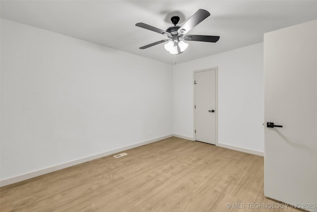 4235 E 104th St, Tulsa, OK 74137 - unfurnished room with light wood-style floors and a ceiling fan