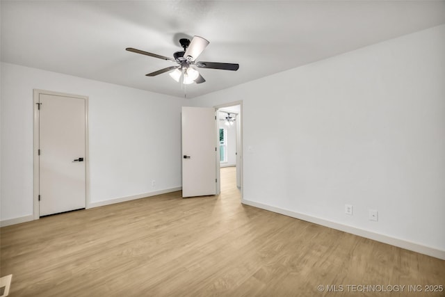 4235 E 104th St, Tulsa, OK 74137 - empty room featuring a ceiling fan and light wood-style floors