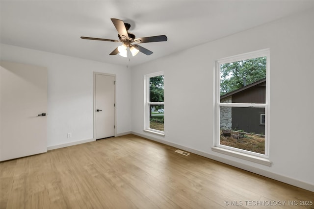 4235 E 104th St, Tulsa, OK 74137 - spare room with wood finished floors and a ceiling fan