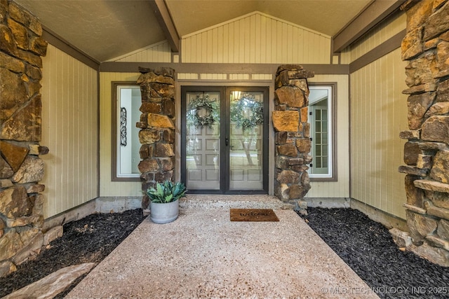 4235 E 104th St, Tulsa, OK 74137 - doorway to property with french doors and stone siding