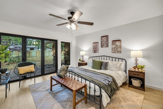 4235 E 104th St, Tulsa, OK 74137 - bedroom featuring access to exterior, light wood-style floors, and ceiling fan