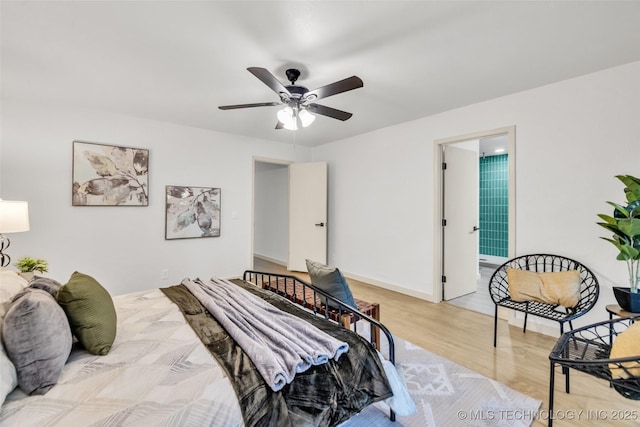 4235 E 104th St, Tulsa, OK 74137 - bedroom featuring light wood finished floors and ceiling fan