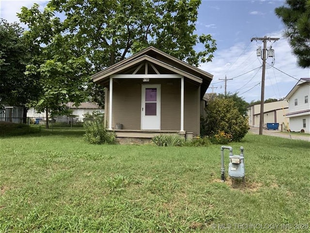 307 N Hartman Ave, Cushing, OK 74023 - view of outdoor structure with a porch