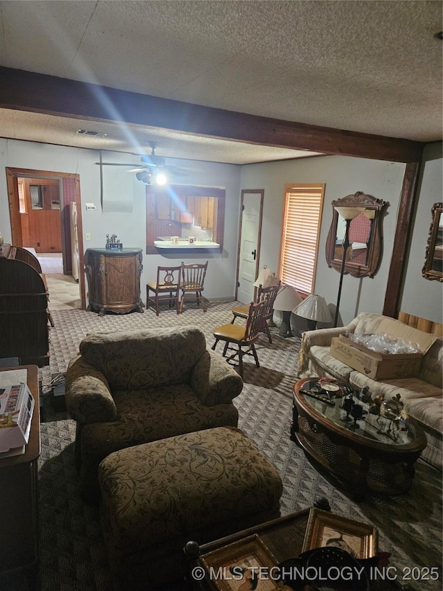 307 N Hartman Ave, Cushing, OK 74023 - living area featuring carpet and a ceiling fan