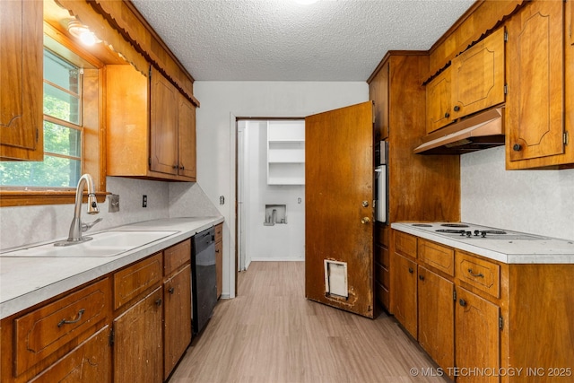 3344 S 120th E Ave, Tulsa, OK 74146 - kitchen with light wood finished floors, a textured ceiling, light countertops, brown cabinets, and under cabinet range hood