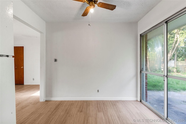 3344 S 120th E Ave, Tulsa, OK 74146 - empty room with light wood finished floors, ceiling fan, and a textured ceiling