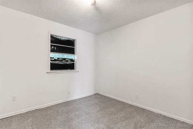 3344 S 120th E Ave, Tulsa, OK 74146 - carpeted empty room with a textured ceiling and baseboards