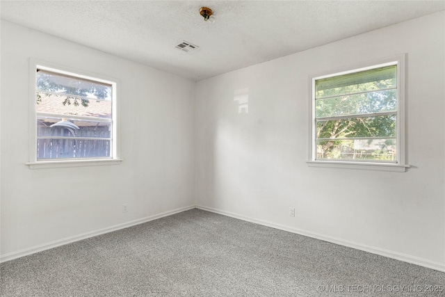 3344 S 120th E Ave, Tulsa, OK 74146 - empty room featuring carpet flooring and a textured ceiling