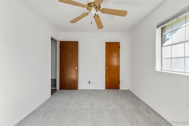 3344 S 120th E Ave, Tulsa, OK 74146 - unfurnished bedroom featuring carpet floors and ceiling fan