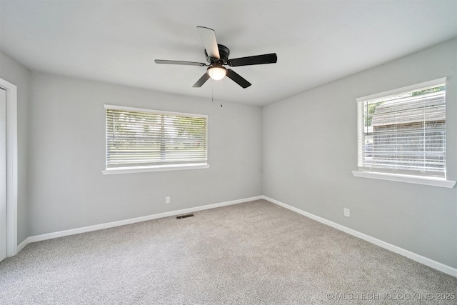 412 W Roger St, Oilton, OK 74052 - empty room with a ceiling fan and carpet