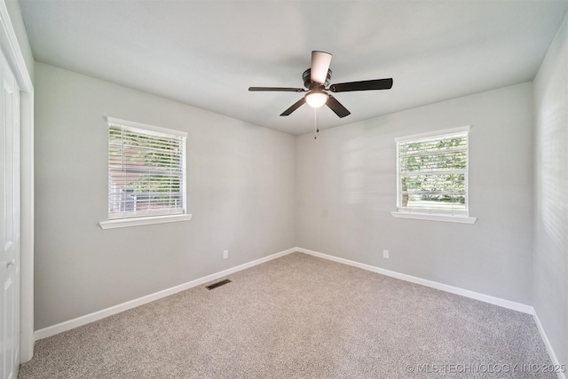 412 W Roger St, Oilton, OK 74052 - carpeted spare room with healthy amount of natural light and a ceiling fan