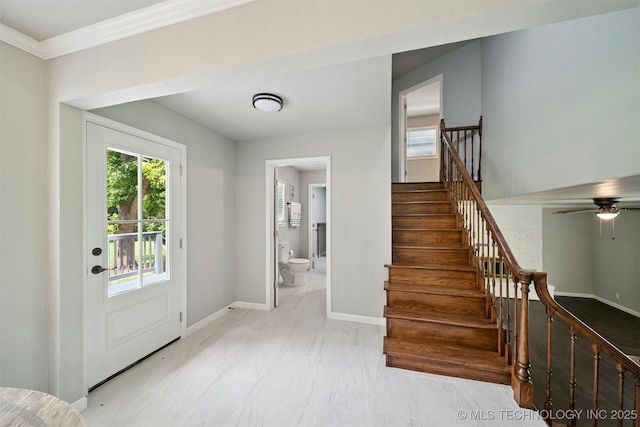 412 W Roger St, Oilton, OK 74052 - foyer featuring stairway, a ceiling fan, and ornamental molding