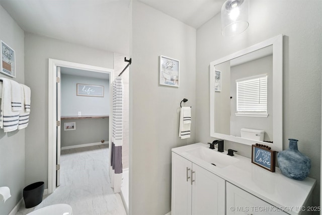 412 W Roger St, Oilton, OK 74052 - full bath with marble look tiles, vanity, and a shower with curtain