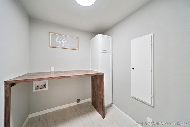 412 W Roger St, Oilton, OK 74052 - washroom featuring hookup for a washing machine, cabinet space, and a desk