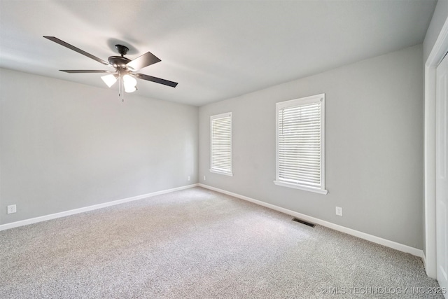 412 W Roger St, Oilton, OK 74052 - carpeted empty room with a ceiling fan and baseboards