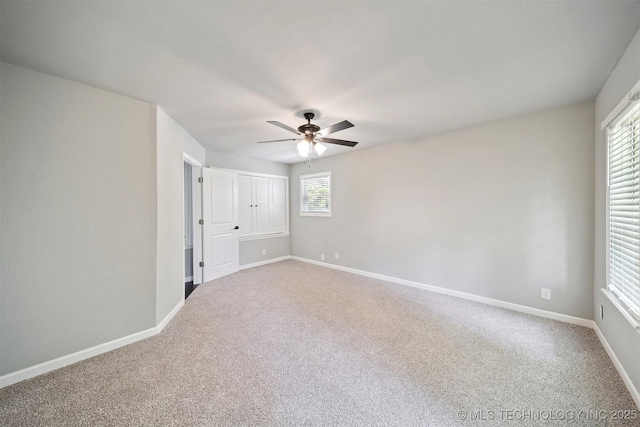 412 W Roger St, Oilton, OK 74052 - unfurnished bedroom featuring carpet flooring and ceiling fan