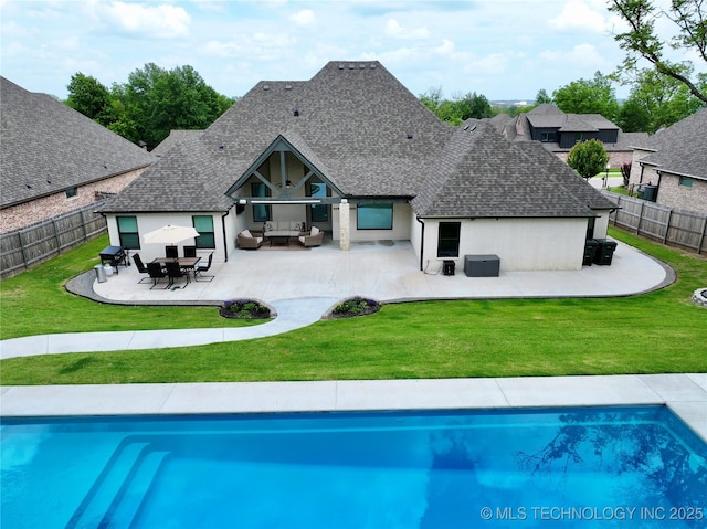 2889 Forest View Dr, Claremore, OK 74017 - rear view of property featuring a shingled roof, an outdoor hangout area, a fenced backyard, a patio, and stucco siding