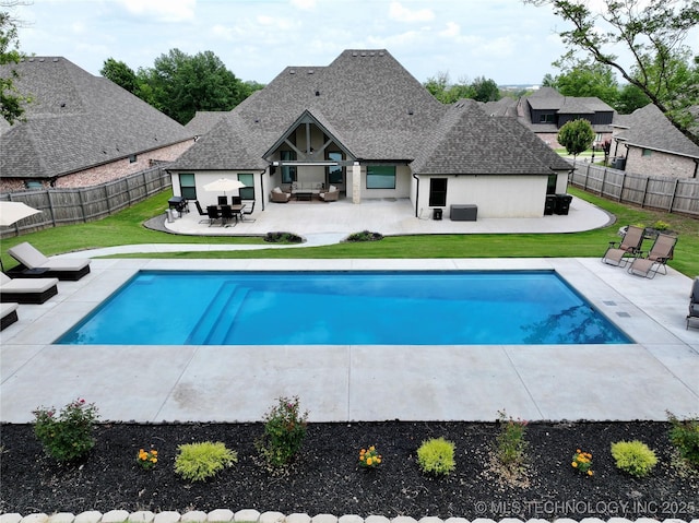 2889 Forest View Dr, Claremore, OK 74017 - view of swimming pool featuring a patio, a fenced backyard, and an outdoor hangout area