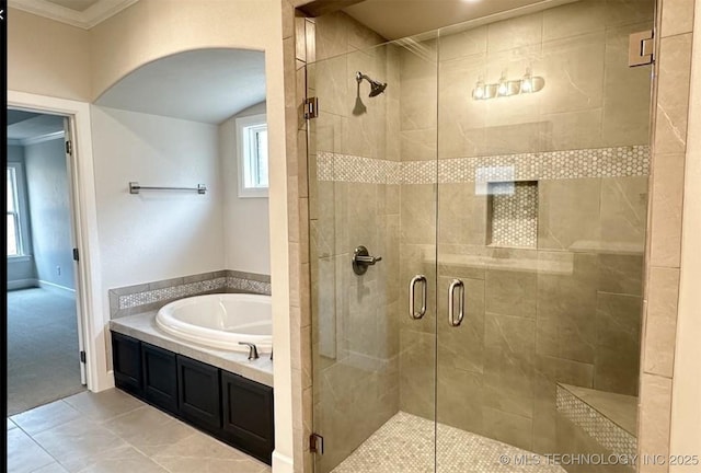 2889 Forest View Dr, Claremore, OK 74017 - full bathroom featuring a bath, ornamental molding, a stall shower, and tile patterned flooring