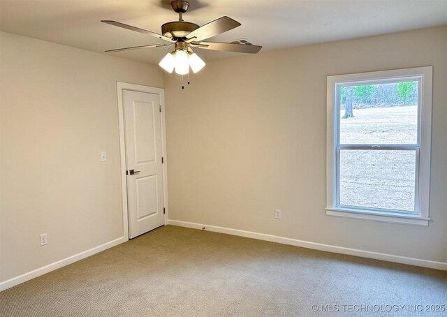 2889 Forest View Dr, Claremore, OK 74017 - spare room with carpet and ceiling fan