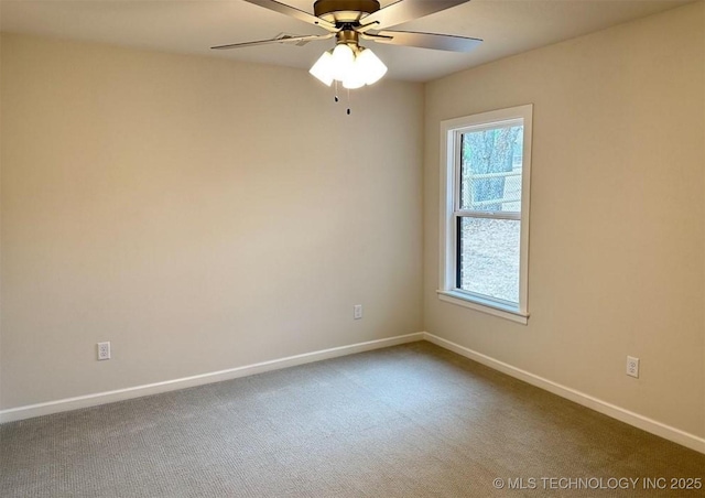 2889 Forest View Dr, Claremore, OK 74017 - spare room featuring dark colored carpet and ceiling fan
