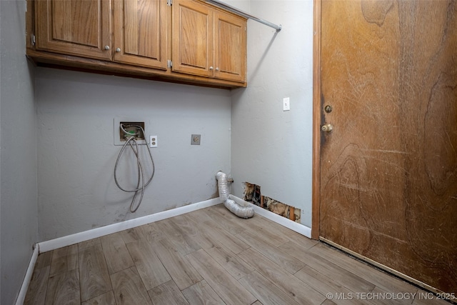 16304 Bandera, Oklahoma City, OK 73013 - laundry room featuring cabinet space, light wood finished floors, and washer hookup
