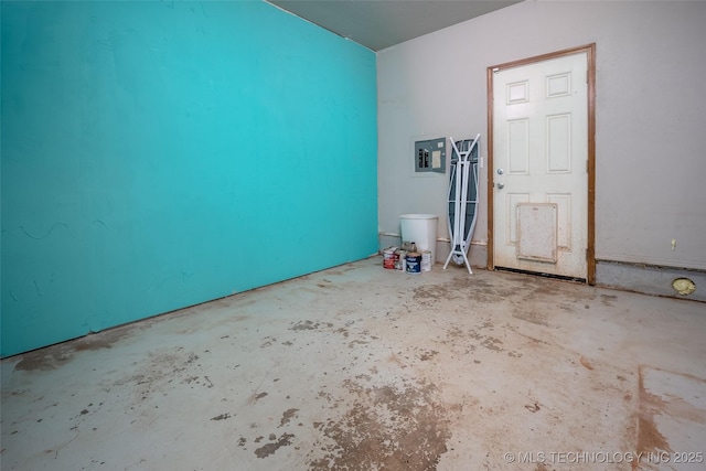 16304 Bandera, Oklahoma City, OK 73013 - spare room featuring unfinished concrete flooring and electric panel
