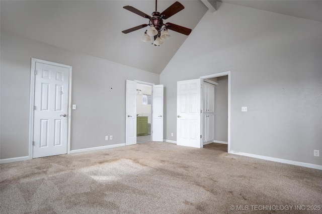 16304 Bandera, Oklahoma City, OK 73013 - unfurnished bedroom featuring high vaulted ceiling, beamed ceiling, carpet floors, ensuite bath, and a ceiling fan