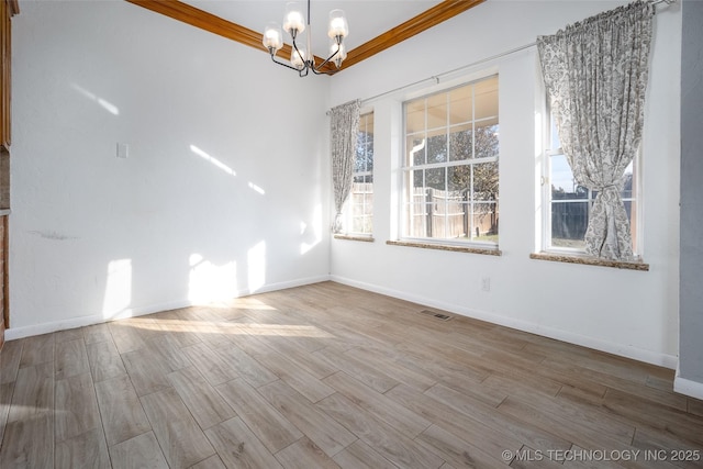 16304 Bandera, Oklahoma City, OK 73013 - empty room featuring a chandelier and wood finished floors