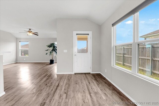 3729 S 150th E Ave, Tulsa, OK 74134 - empty room featuring vaulted ceiling, wood finished floors, and ceiling fan