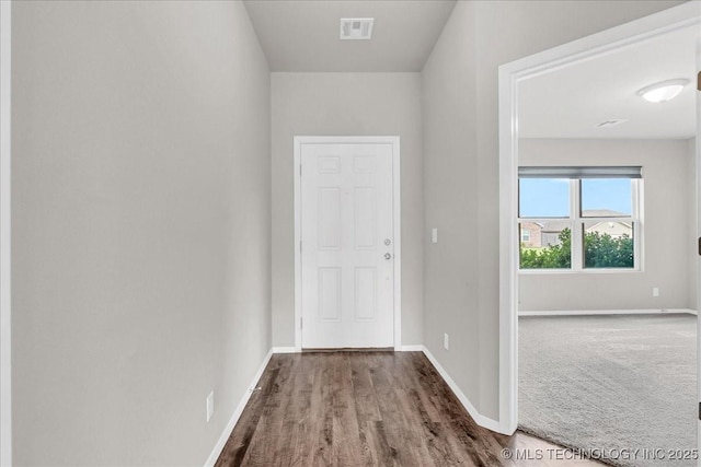 3729 S 150th E Ave, Tulsa, OK 74134 - hallway with baseboards and wood finished floors