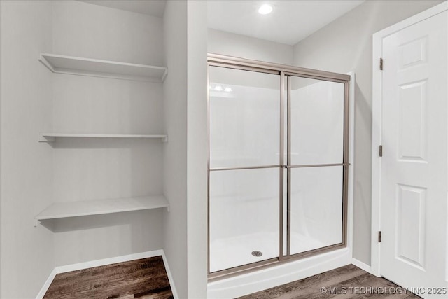 3729 S 150th E Ave, Tulsa, OK 74134 - bathroom with a shower stall, wood finished floors, and recessed lighting