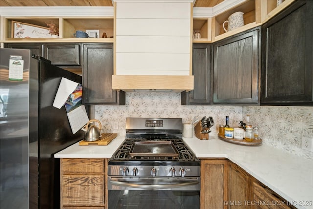 32528 W 261st St S, Bristow, OK 74010 - kitchen featuring appliances with stainless steel finishes, open shelves, backsplash, light countertops, and wall chimney exhaust hood