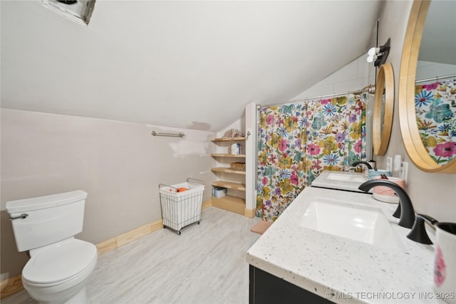 32528 W 261st St S, Bristow, OK 74010 - bathroom featuring vaulted ceiling, double vanity, and wood finished floors