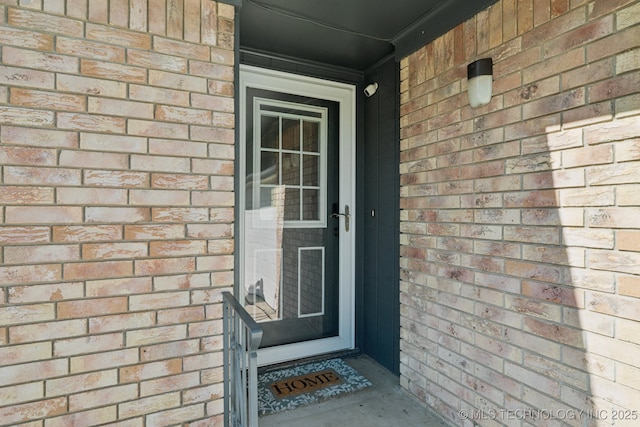 208 N Davis Ave W, Claremore, OK 74017 - doorway to property with brick siding