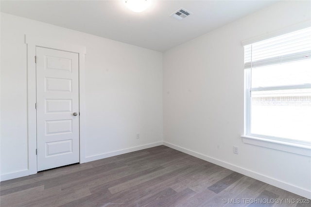 304 S 25th St, Collinsville, OK 74021 - spare room with wood finished floors and baseboards