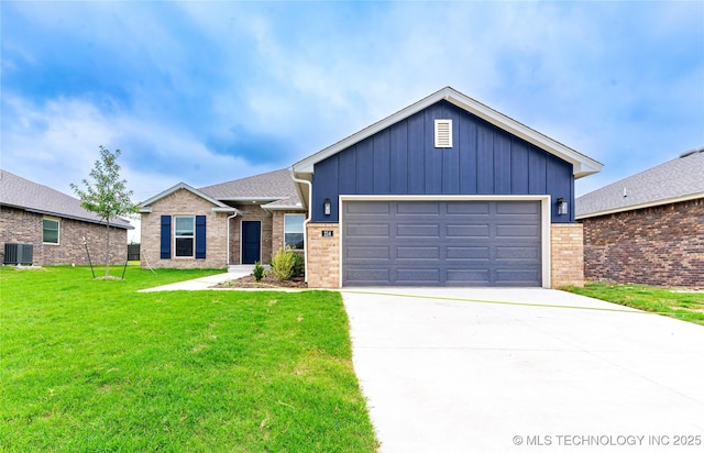 214 S 26th St, Collinsville, OK 74021 - ranch-style house featuring brick siding, a front yard, concrete driveway, board and batten siding, and a garage
