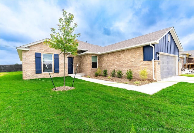 214 S 26th St, Collinsville, OK 74021 - ranch-style house with a garage, board and batten siding, roof with shingles, brick siding, and driveway