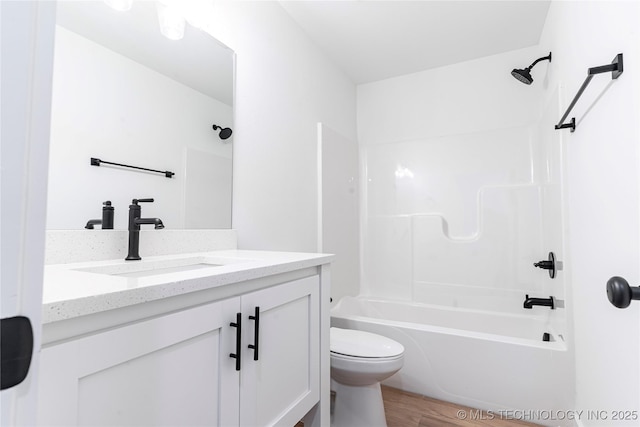 214 S 26th St, Collinsville, OK 74021 - bathroom with vanity, shower / bath combination, and wood finished floors