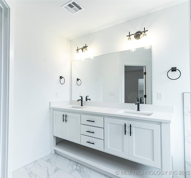 214 S 26th St, Collinsville, OK 74021 - bathroom with double vanity and marble look tile flooring