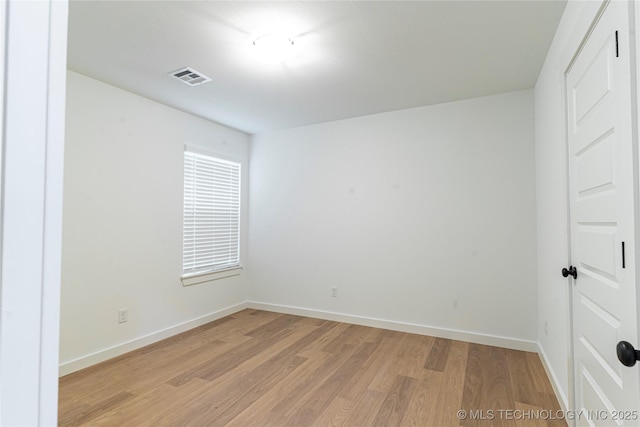 214 S 26th St, Collinsville, OK 74021 - spare room featuring light wood finished floors and baseboards