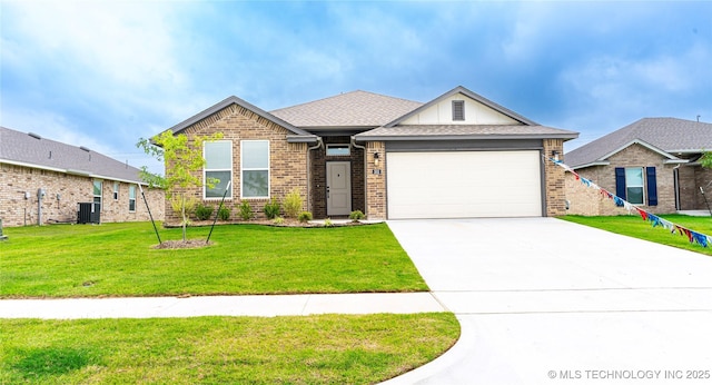 302 S 26th St, Collinsville, OK 74021 - view of front facade with brick siding, an attached garage, concrete driveway, a front lawn, and roof with shingles