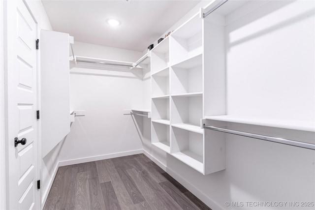 302 S 26th St, Collinsville, OK 74021 - spacious closet featuring dark wood-style floors