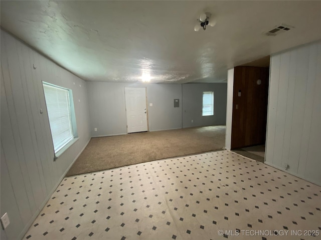 41 G SE, Ardmore, OK 73401 - unfurnished room with carpet and wooden walls